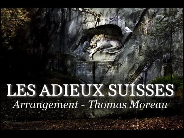 sculpture d'un lion sur un mur de pierre pour la composition "Les adieux suisses" de Thomas Moreau